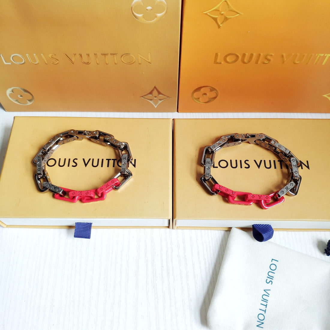 LV DAMIER quenched color blocking bracelet in red and silver.